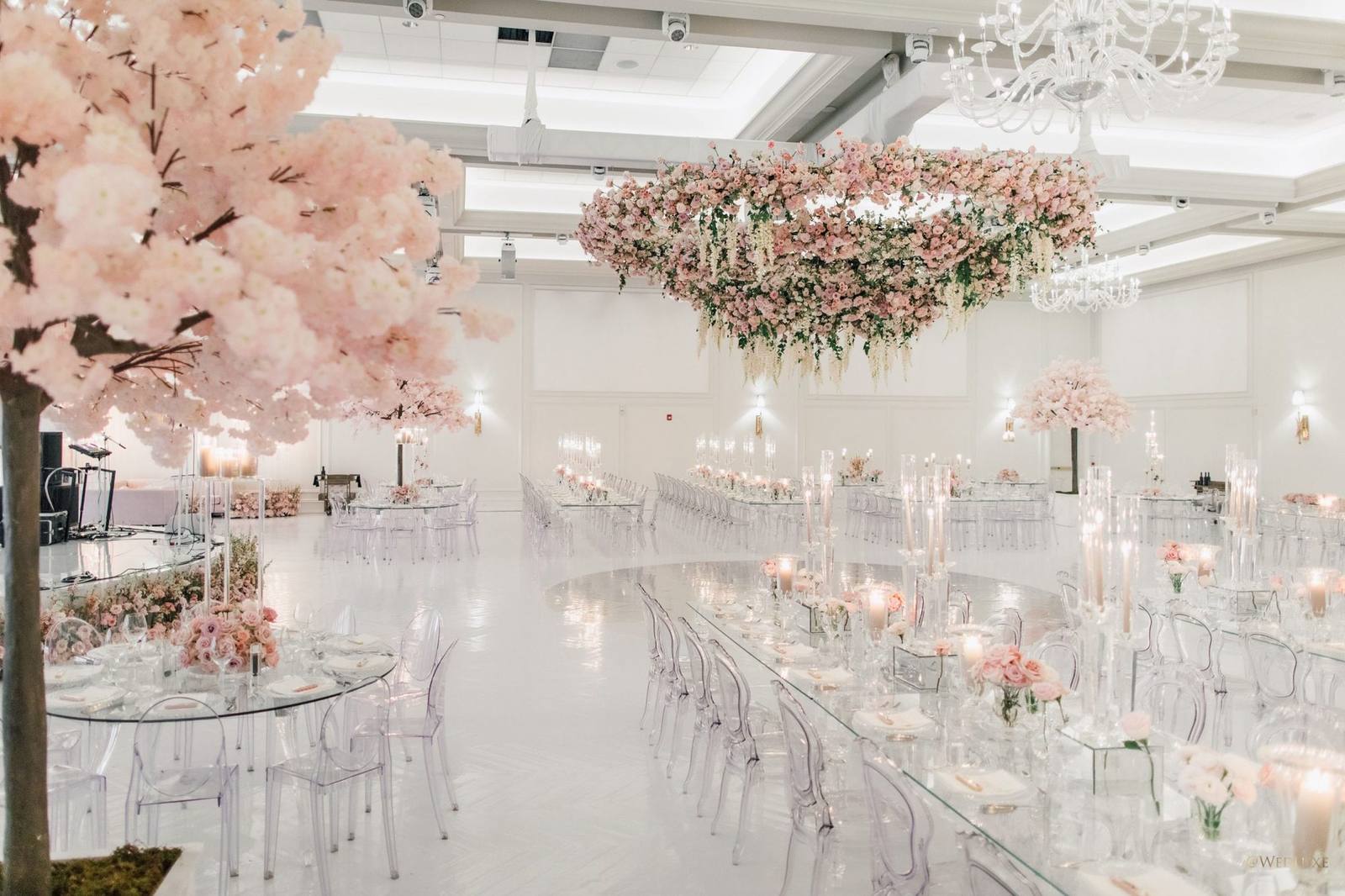 White custom printed dance floor in a floral wedding reception room